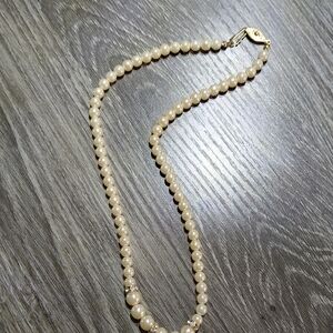 Elegant Pearl Necklace with Gold Accents
